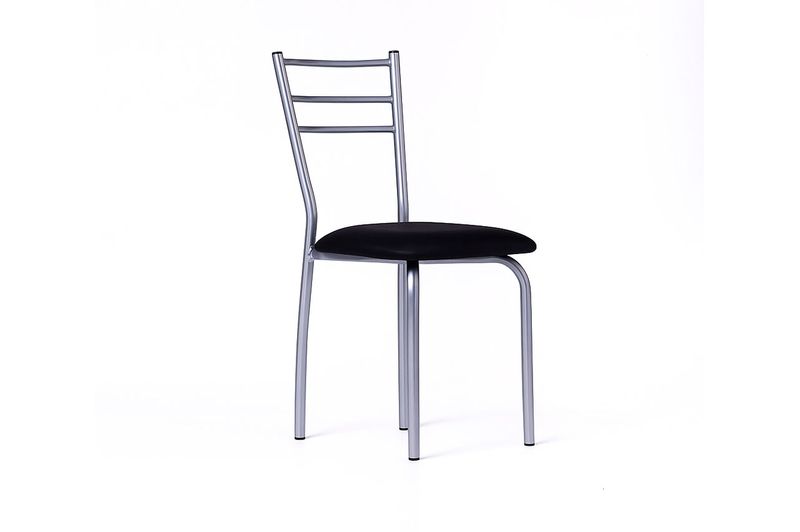 Combo Mesa Atenas 1,10M + 4 Sillas Dakar Auguste Negro _0003_A_digital_photograph_features_a_single_metal_dinin